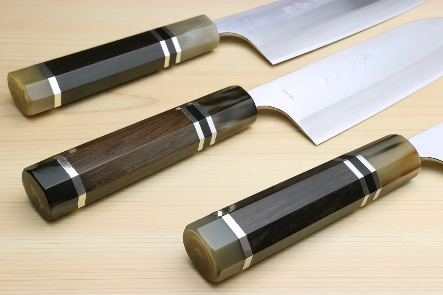 Yoshihiro High Speed Steel HAP40 Santoku Multipurpose Chefs Knife, Octagonal Ebony Wood Handle with Triple Ring - Image 7